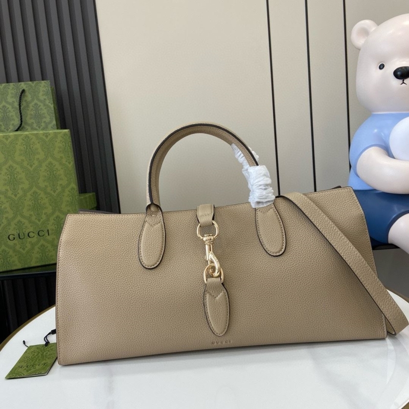 G*u*i top handle bags